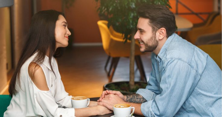 Couple discussing calmly, demonstrating healthy conflict resolution