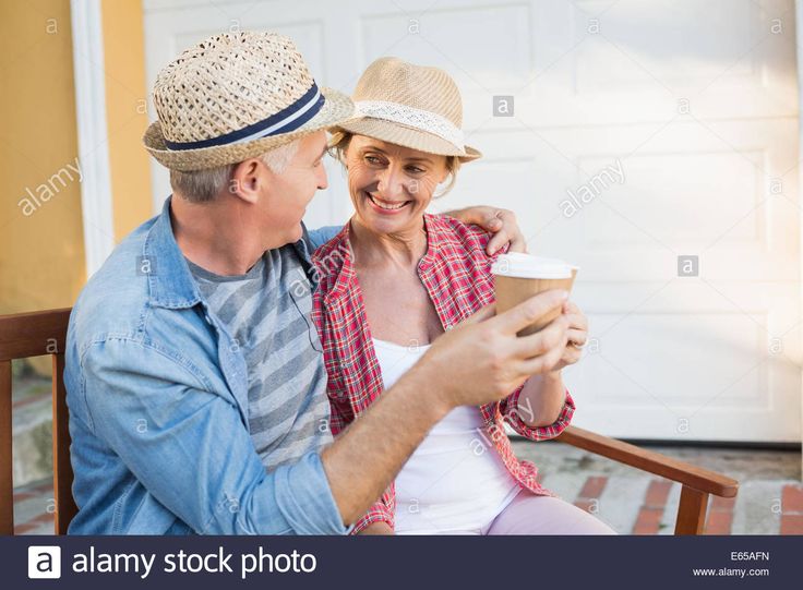 Couple deep in conversation over coffee, reflecting connection