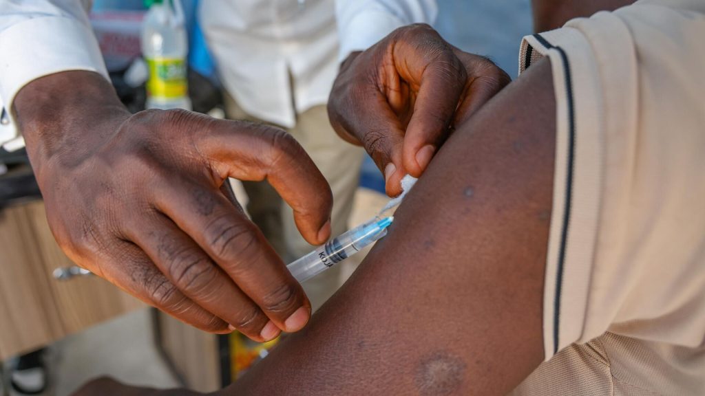 Health worker administering mpox vaccine in Goma, DRC