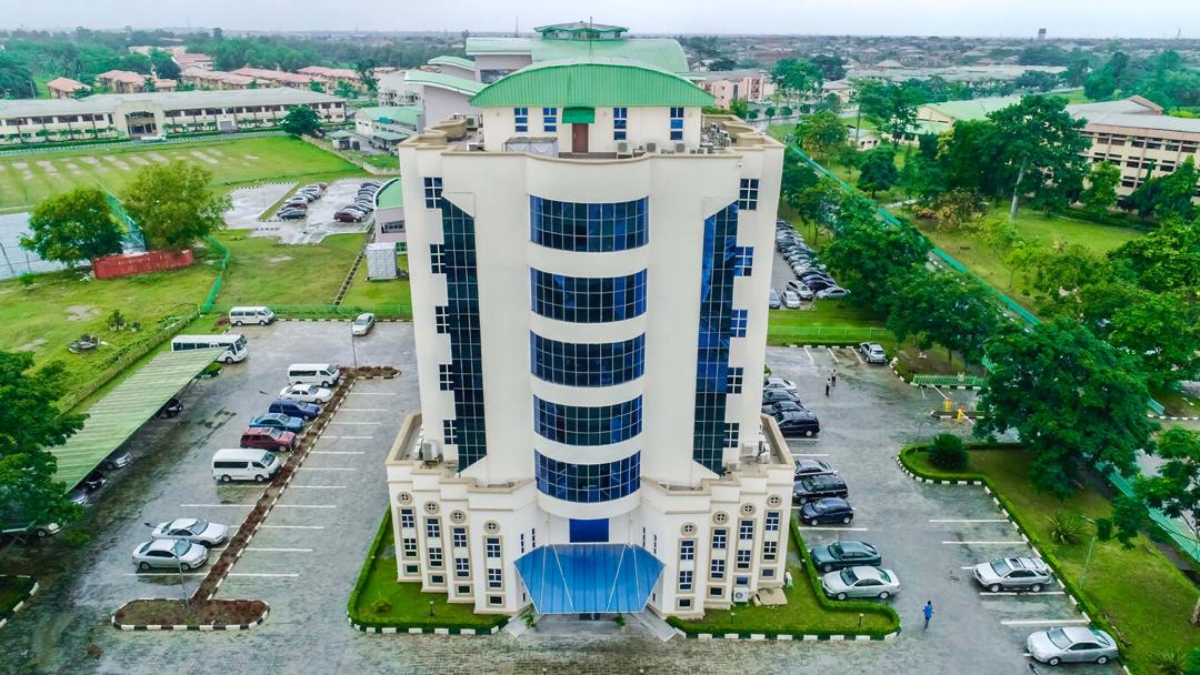 “Covenant University main gate with students – ranked best university in Nigeria 2025”