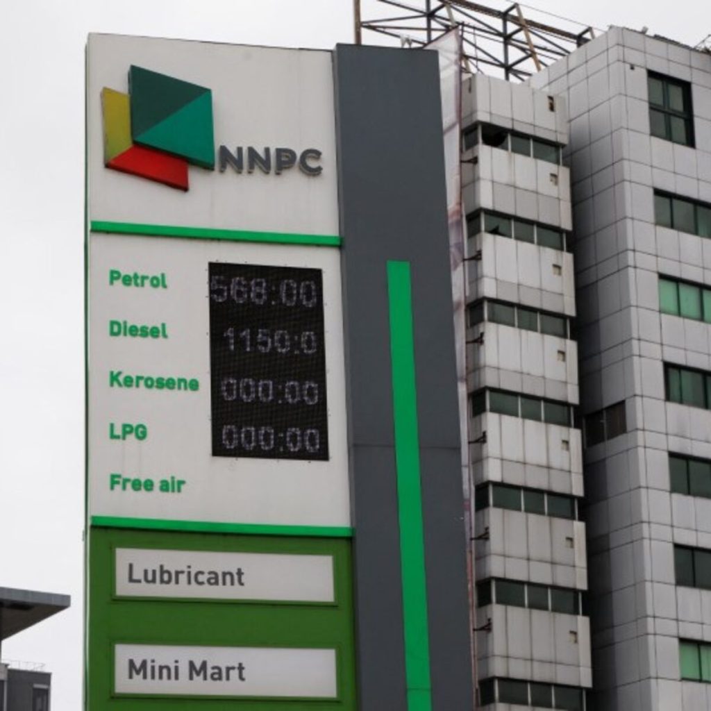 NNPC petrol station pump price board reflecting a sudden fuel price change