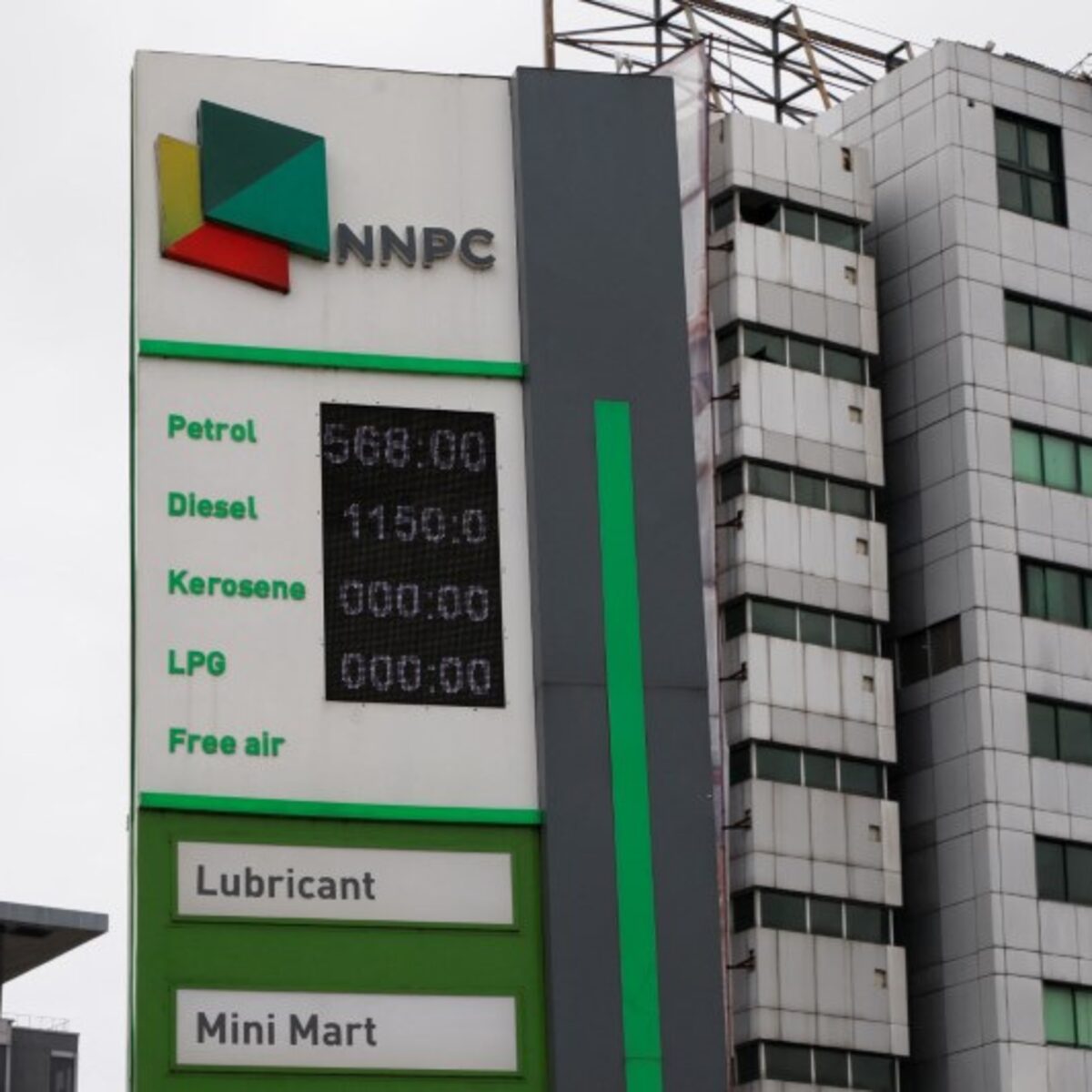 NNPC petrol station pump price board reflecting a sudden fuel price change