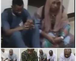 INEC staff and PDP officials squatting during arrest at Ogun by-election scene