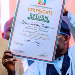 President Bola Tinubu receiving APC Certificate of Return for 2027 election