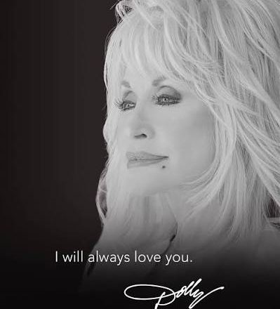 Country music icon Dolly Parton performing on stage.