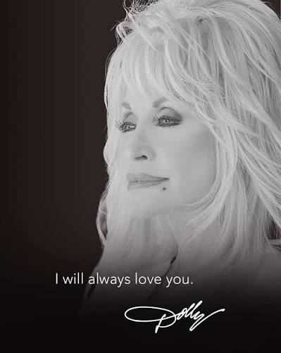 Country music icon Dolly Parton performing on stage.
