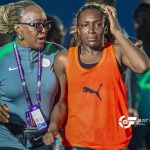 Super Falcons players looking disappointed on the pitch after loss to South Africa.