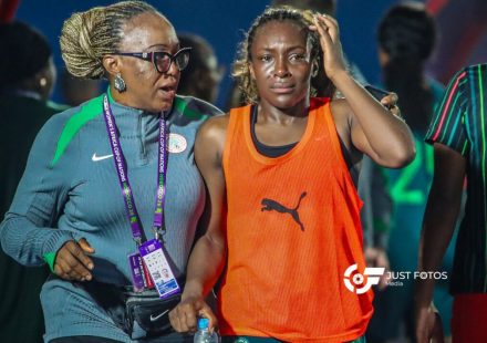 Super Falcons players looking disappointed on the pitch after loss to South Africa.