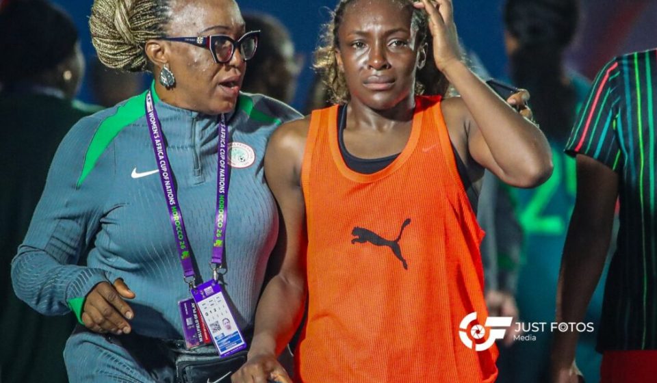 Super Falcons players looking disappointed on the pitch after loss to South Africa.