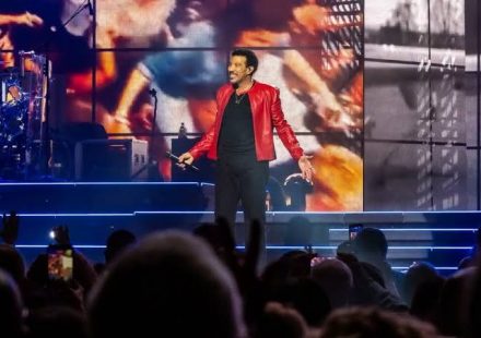 Lionel Richie performing live on stage during his 2026 concert tour.