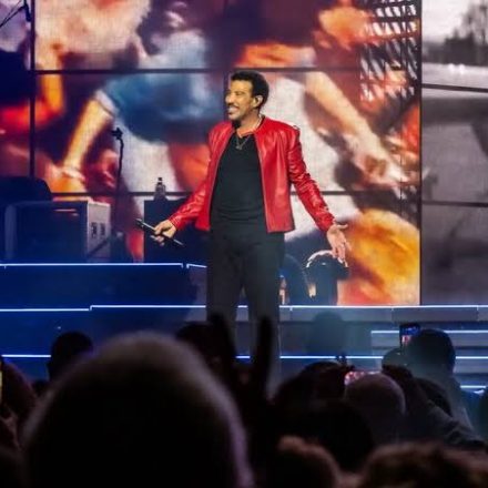 Lionel Richie performing live on stage during his 2026 concert tour.