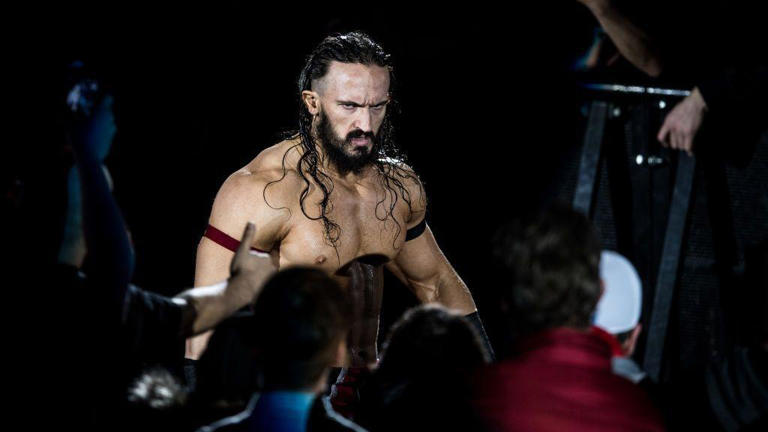 Wrestler Benjamin Satterley, known as Pac, in the ring during an AEW event.