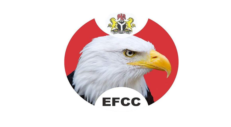 EFCC Chairman Ola Olukoyede speaking at a press conference alongside digital cryptocurrency icons.