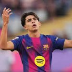Toni Fernández posing in a FC Barcelona jersey prior to his transfer to Venezia FC.