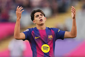 Toni Fernández posing in a FC Barcelona jersey prior to his transfer to Venezia FC.